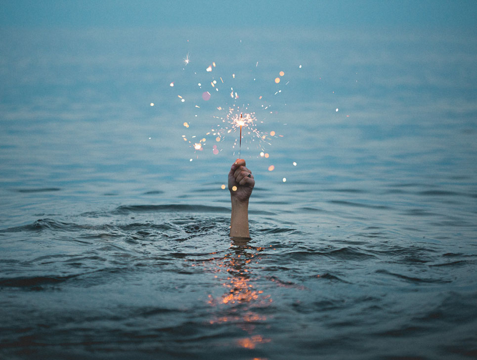 Life Coaching - Hand out of water with a sparkler